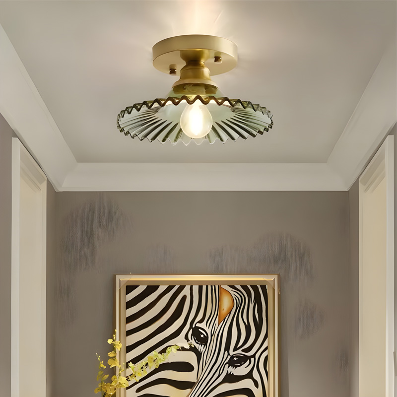 Vintage plafondlamp met geribbelde bloemblaadjes van helder glas